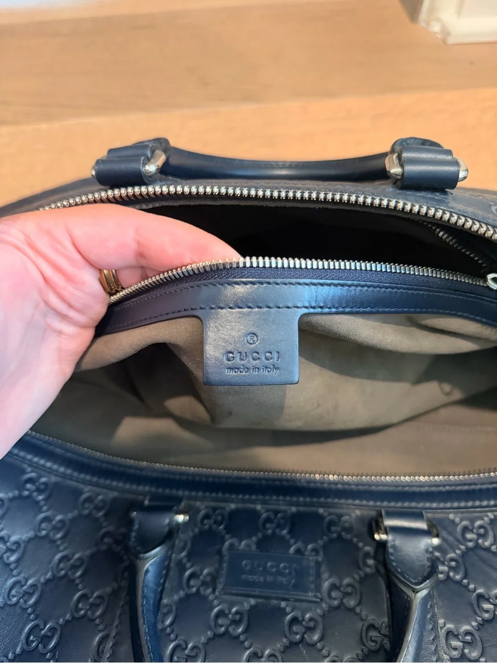 Gucci Navy Embossed GG Leather Duffel Bag